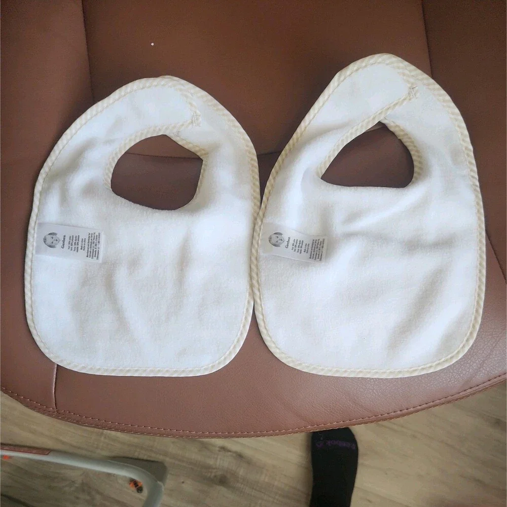 Gerber Baby Muslin Bibs 2-Pack White Ivory Soft Unisex Infant Feeding Gift